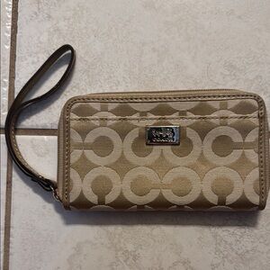 Tan Wristlet Wallet with Logo Pattern
